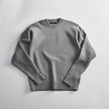 Soft, cozy knitted sweater made from premium cotton blend